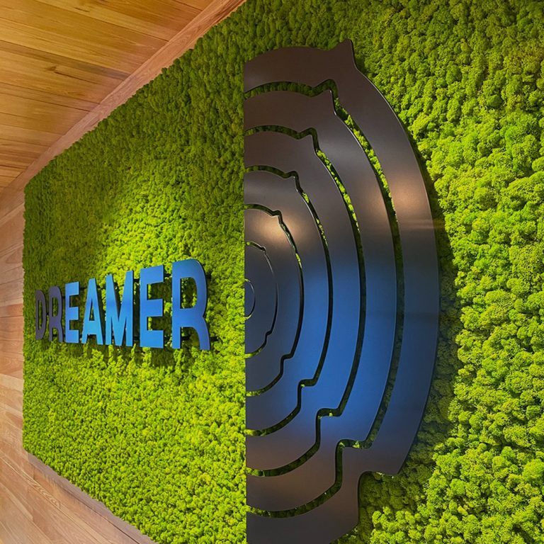 dreamer sign, featuring logo design by dif design, installed as a sign on a live moss wall
